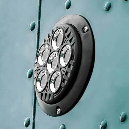 black legacy series round work light with flange mount on rear sleeper