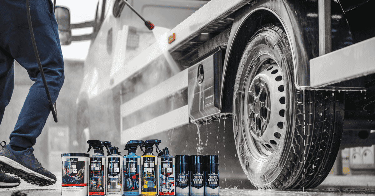 Man Power Washing Semi with Vendetta Cleaning Kit Overlayed in Front Power washing semi truck with hose