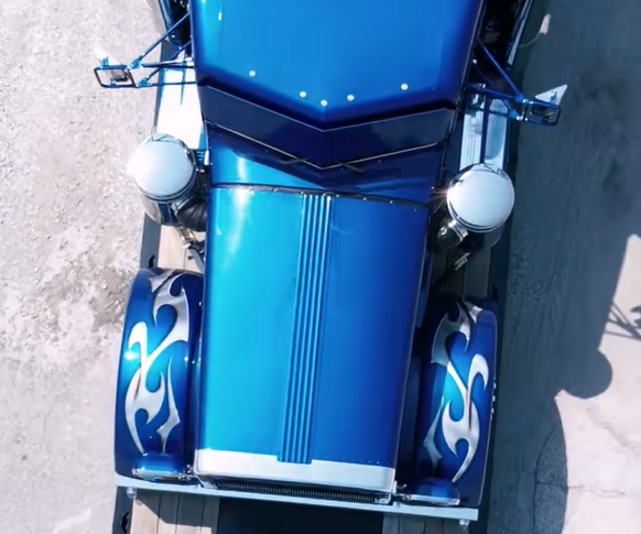 Ivys Poison Aerial shot of semi truck custom paint job